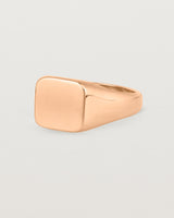 Angled view of the Sempré Signet Ring in Rose Gold.