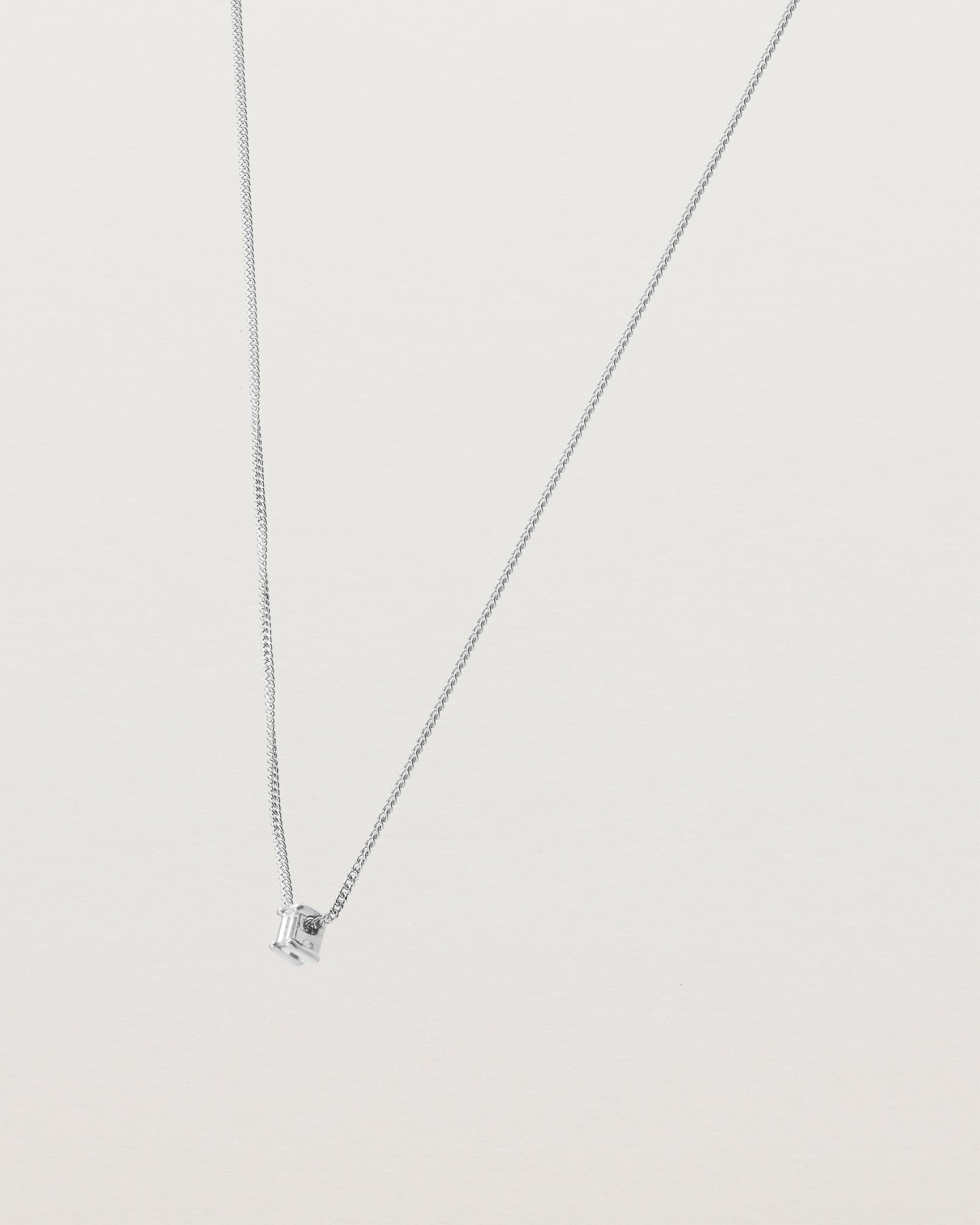 Angled view of the Sena Slider Necklace with White Diamond in White Gold.