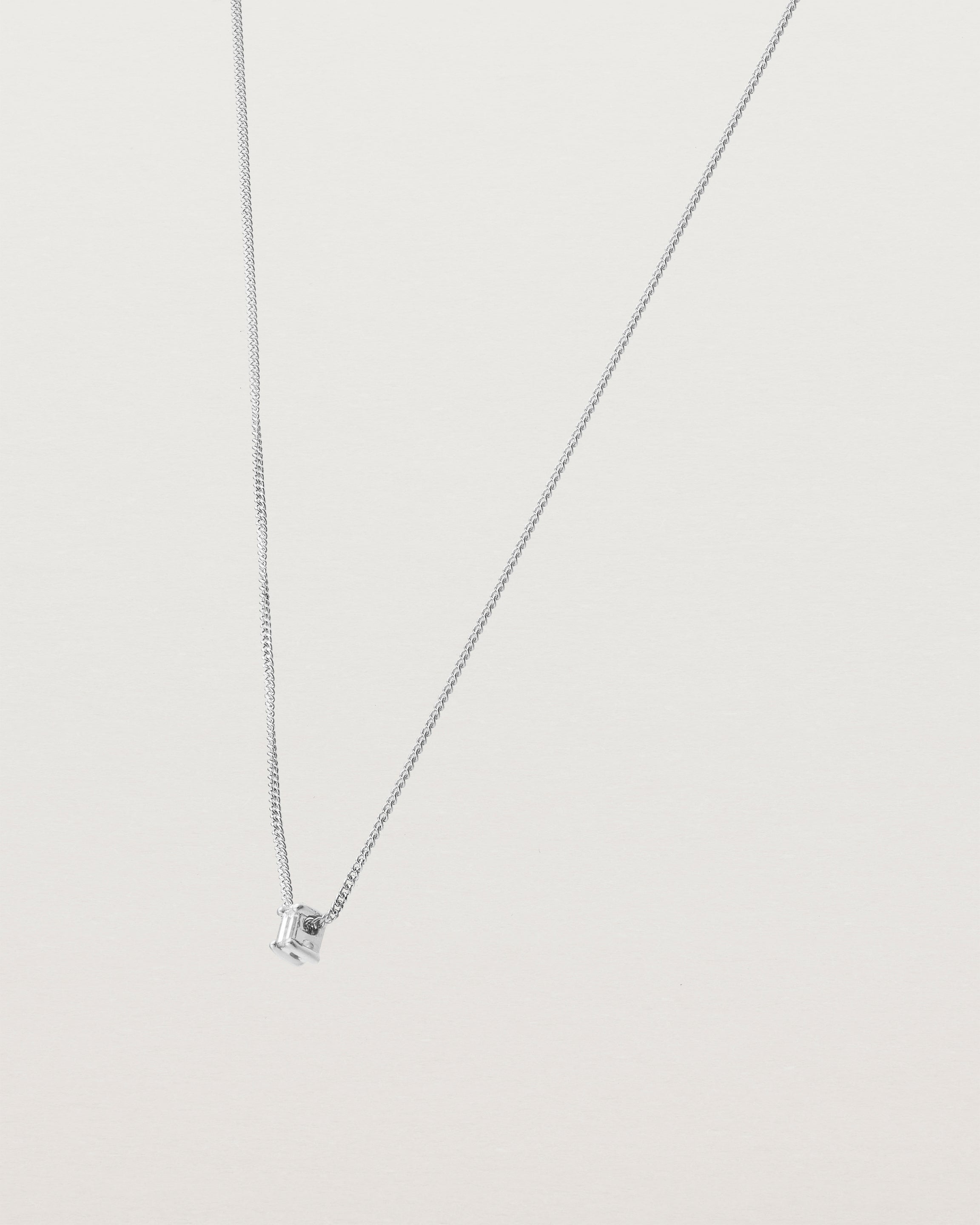 Angled view of the Sena Slider Necklace with White Diamond in White Gold.