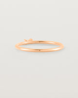 Fine rose gold ring with a champagne coloured helidor stone