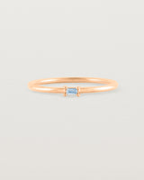 Fine rose gold ring with a champagne coloured helidor stone