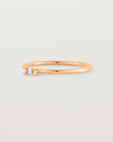 Fine rose gold ring with a champagne coloured helidor stone