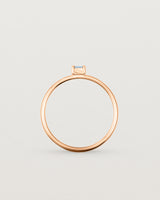 Fine rose gold ring with a champagne coloured helidor stone