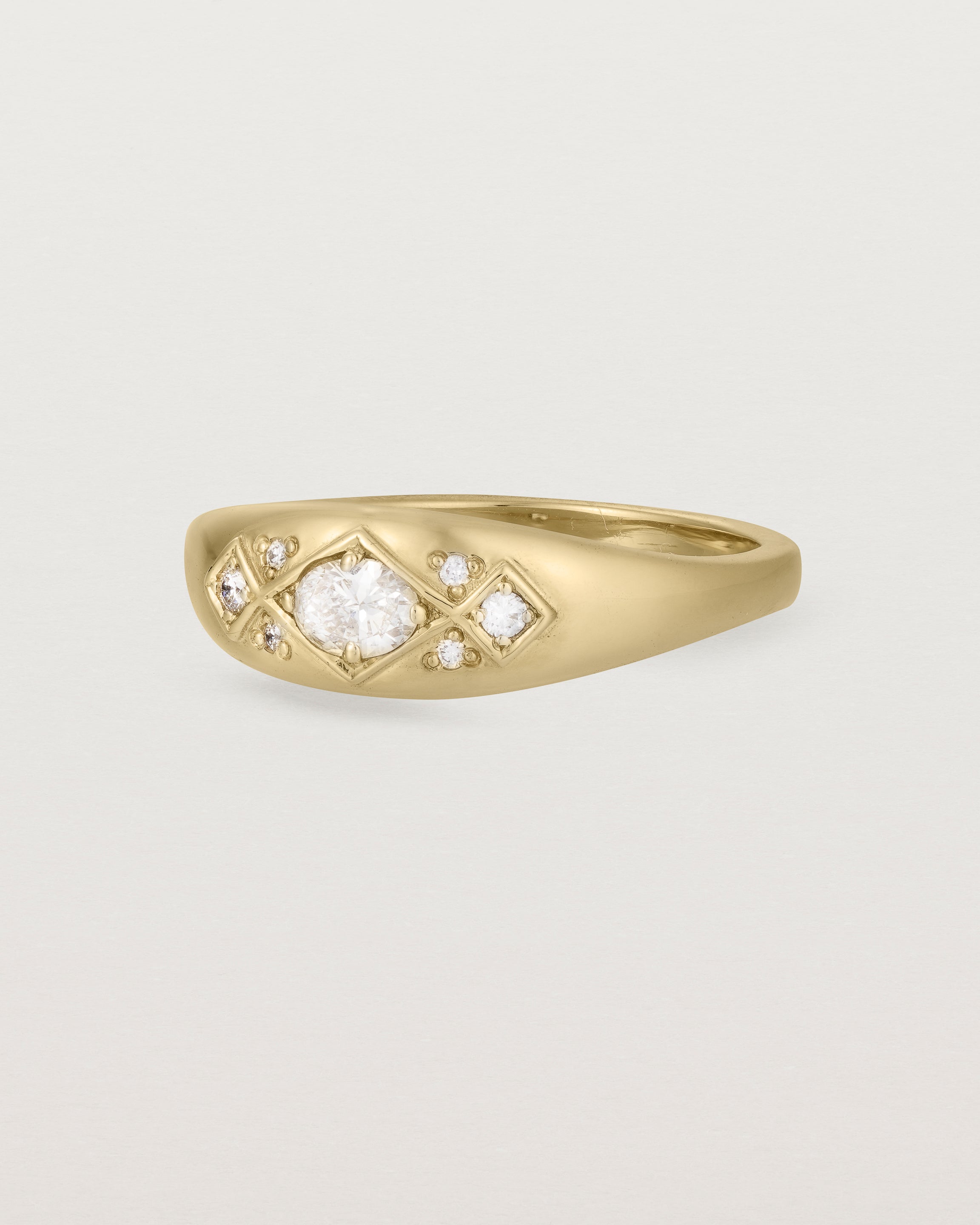 Angled view of the Seule Cheri Ring | Diamonds | Yellow Gold.