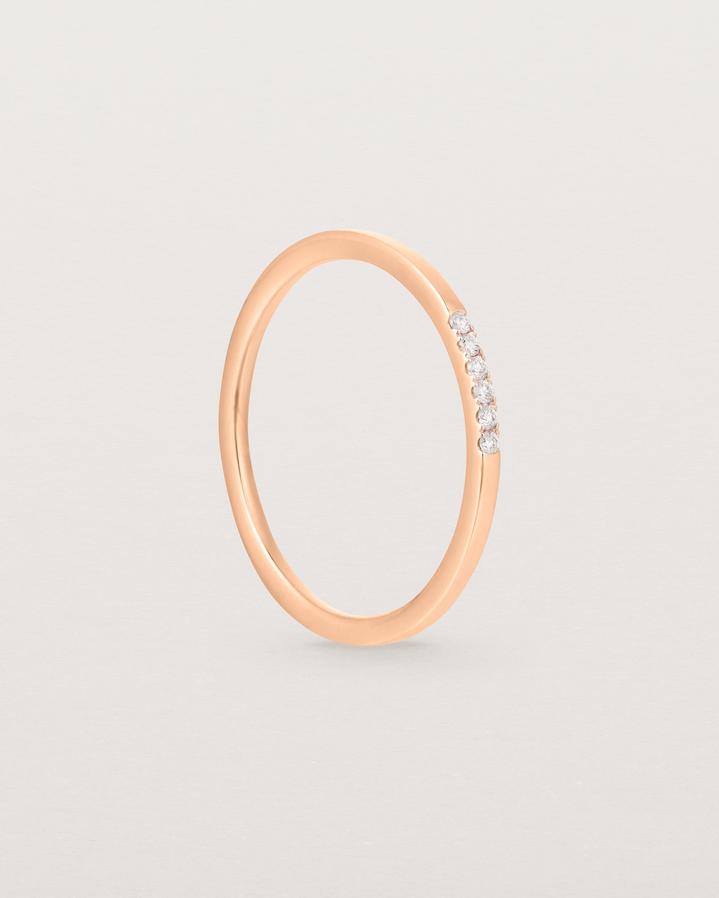 Standing view of the Six Stone Queenie Ring | Diamonds in Rose Gold.