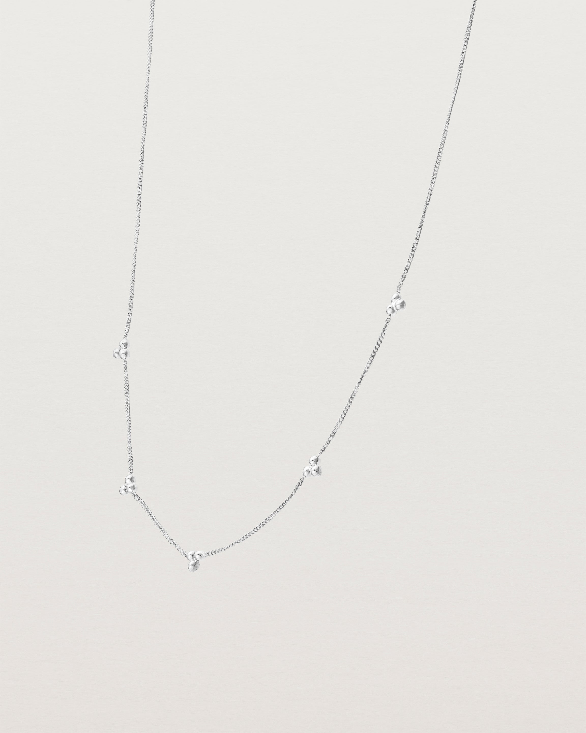 Angled view of the Tellue Necklace in sterling silver.