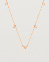 Close up of the Tellue Necklace in rose gold.