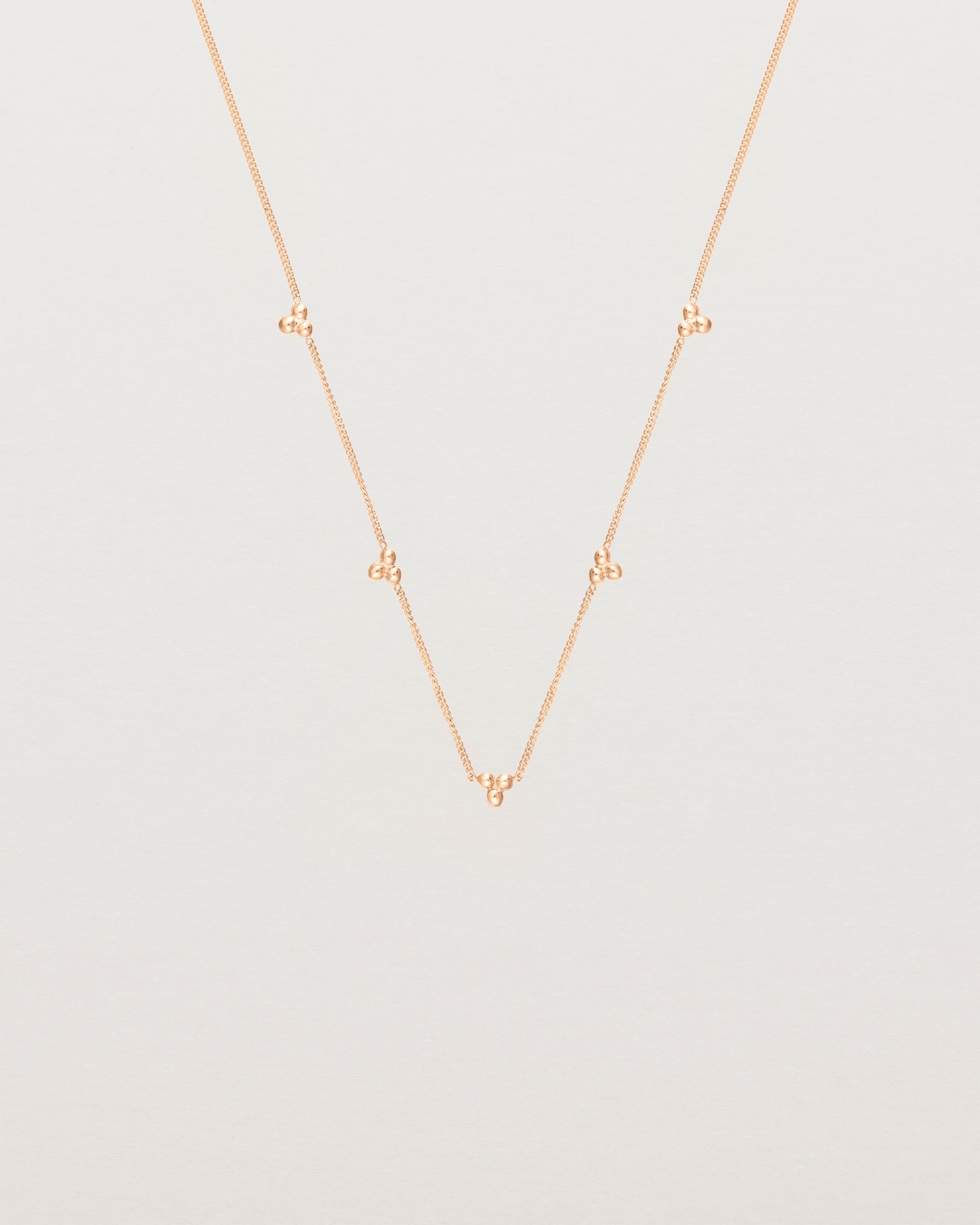 Front view of the Tellue Necklace in rose gold.
