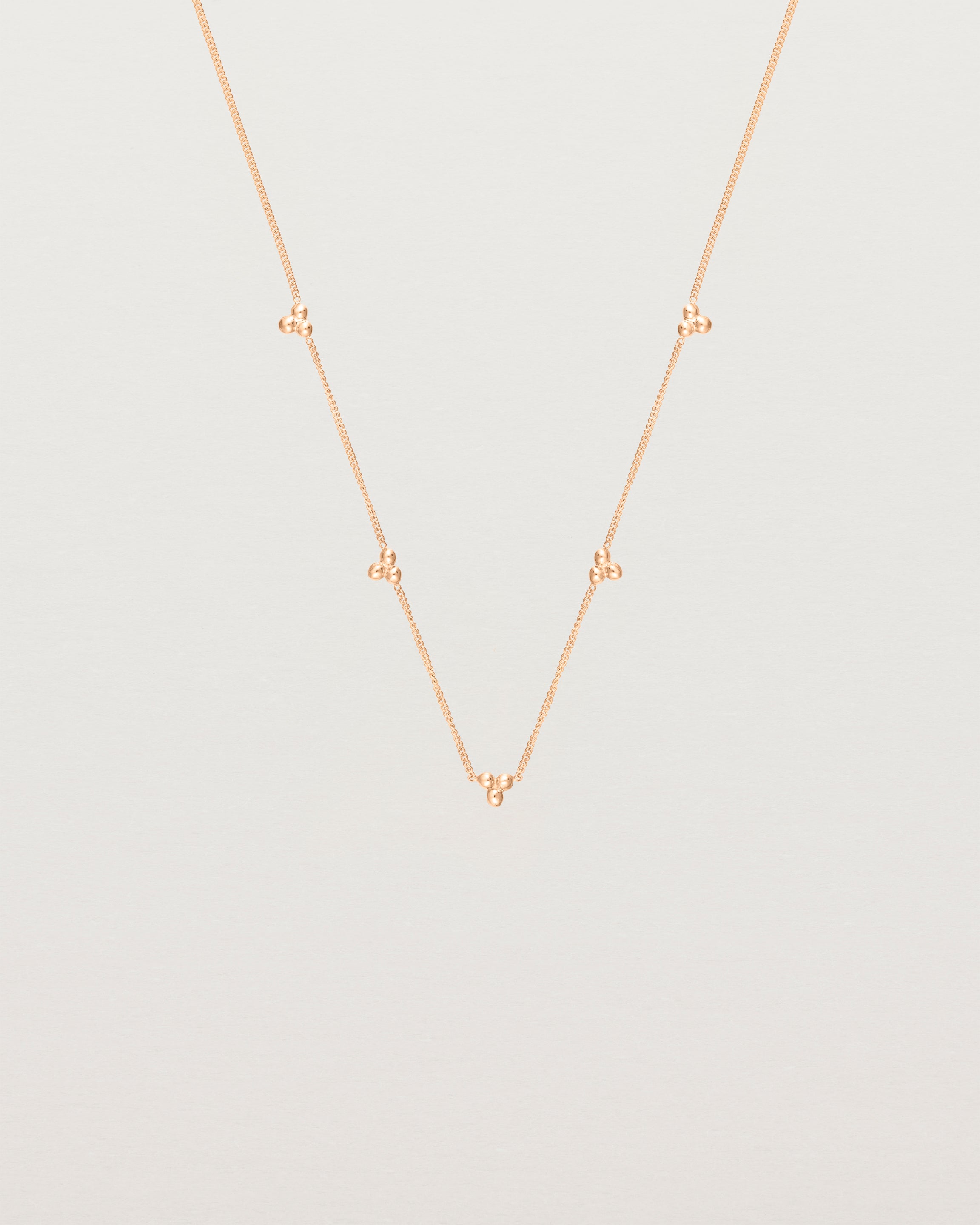 Front view of the Tellue Necklace in rose gold.