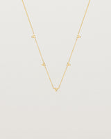 Front view of the Tellue Necklace in yellow gold.