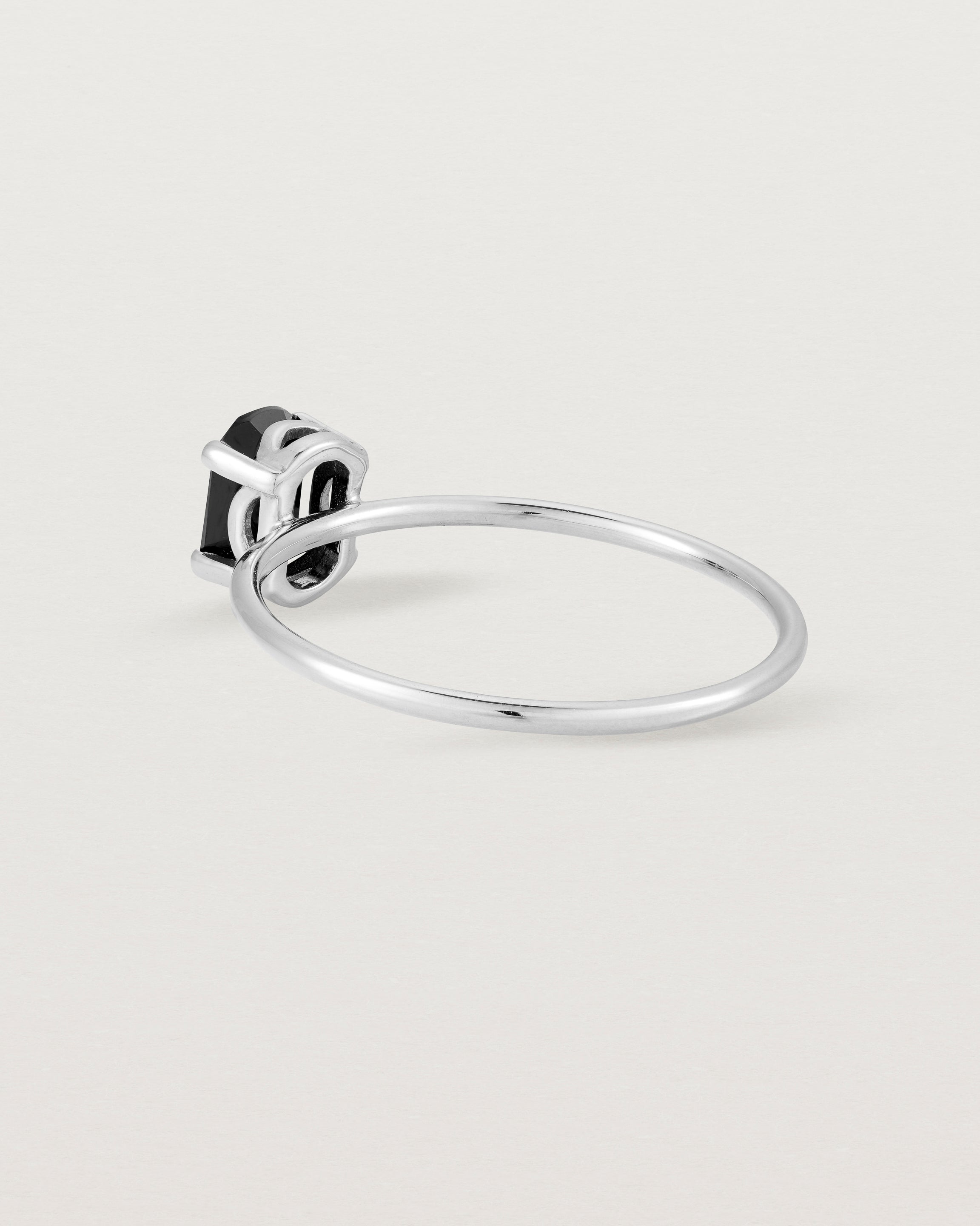 Fine sterling silver band featuring an oval black spinel stone