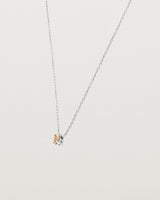 Angled view of the Tiny Marquise Necklace with Rutilated Quartz in sterling silver.