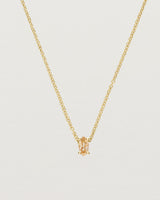 Close up of the Tiny Marquise Necklace with Rutilated Quartz in yellow gold.