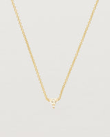 Close up of the Tiny Trillion Necklace with Heliodor in Yellow Gold.