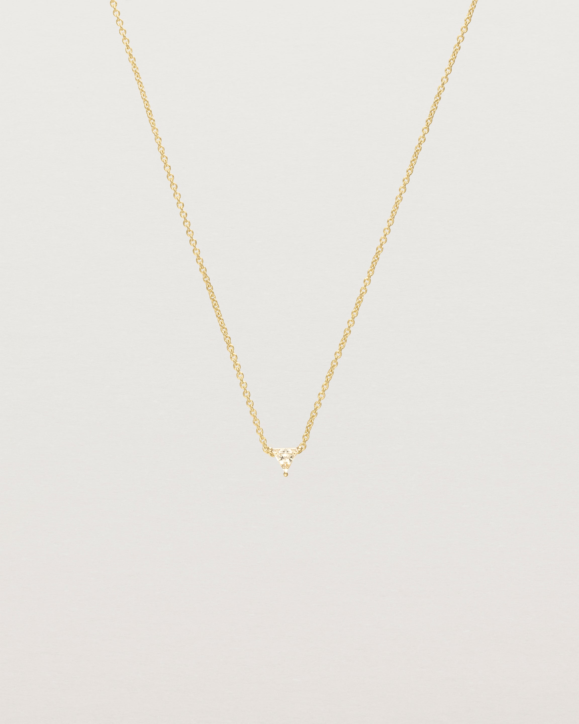 Front view of the Tiny Trillion Necklace with Heliodor in Yellow Gold.