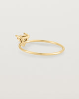 Fine yellow gold ring with a triangle shaped champagne shaped stone