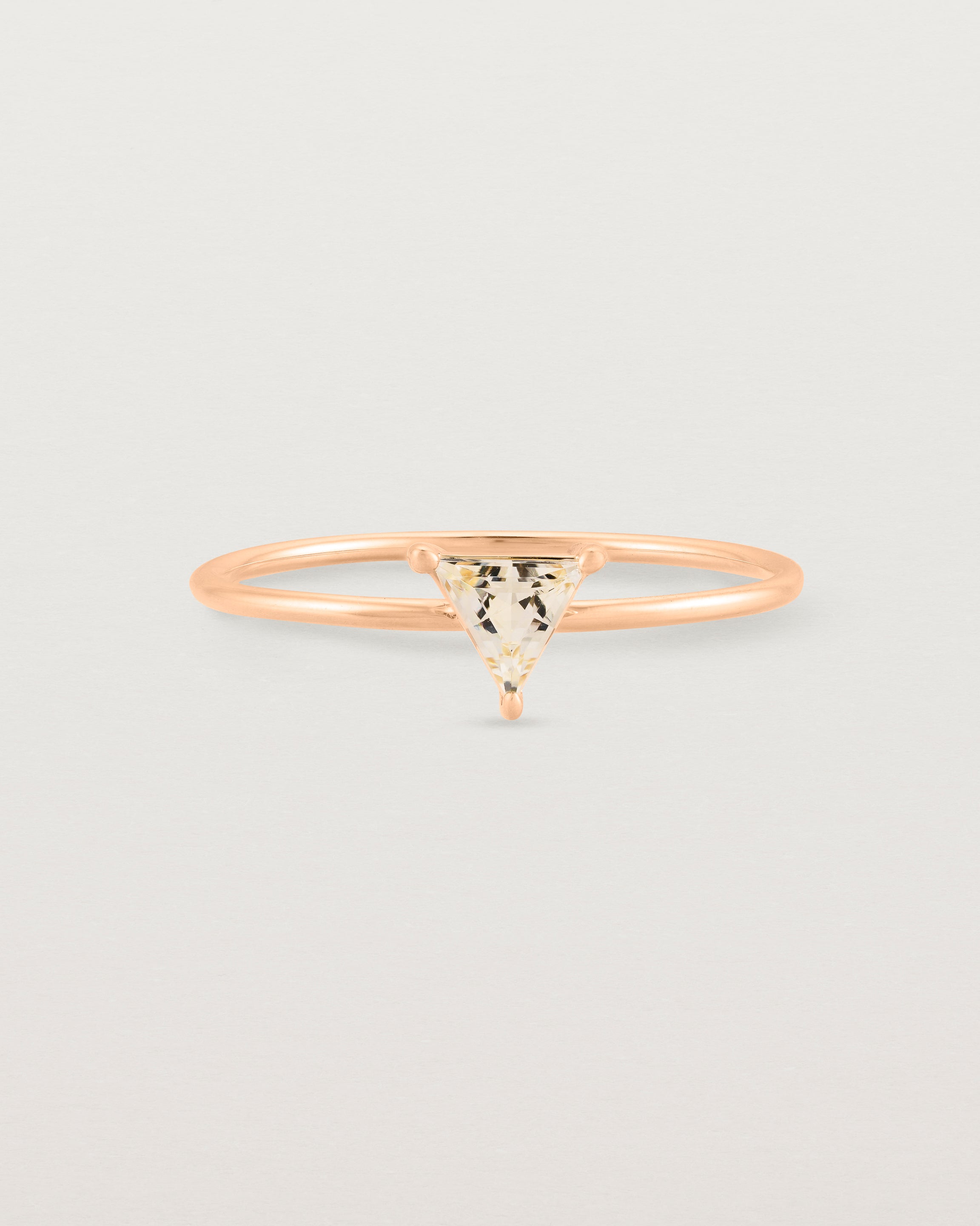 fine rose gold ring featuring a champagne yellow helidor stone