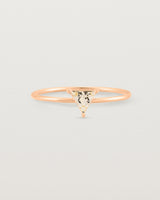 fine rose gold ring featuring a champagne yellow helidor stone