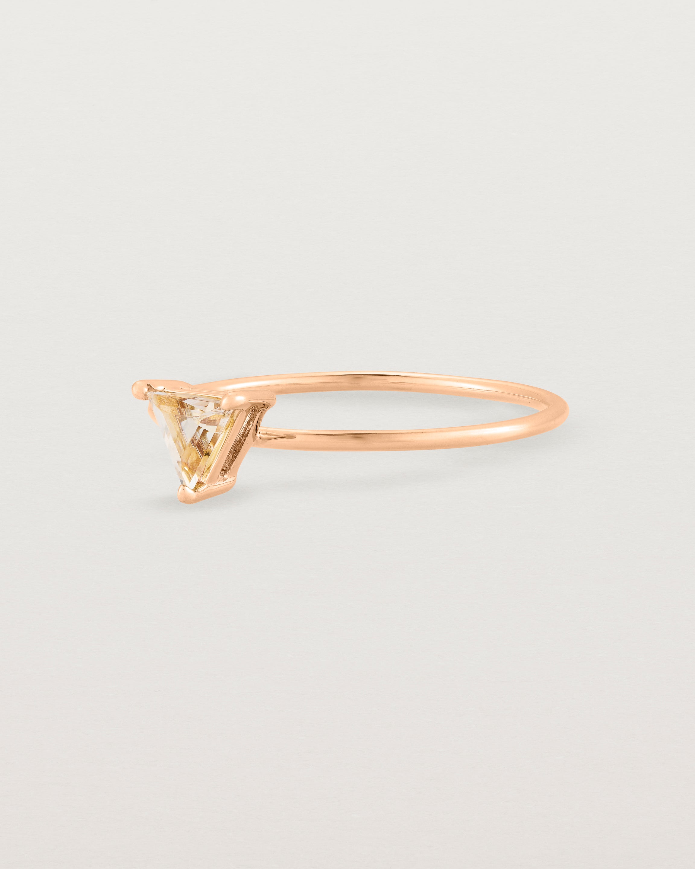 fine rose gold ring featuring a champagne yellow helidor stone