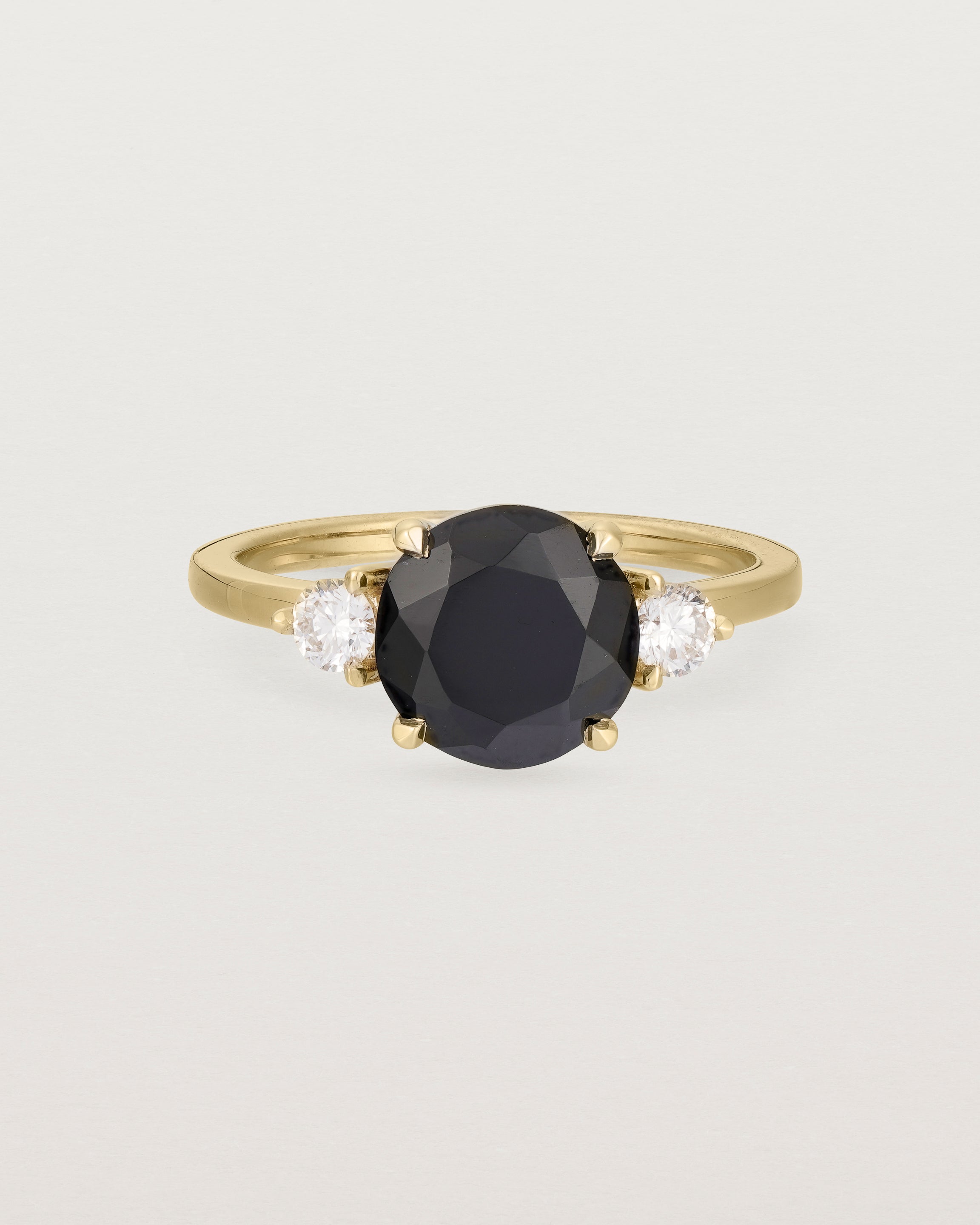 Front view of the Una Round Trio Ring | Black Spinel & Diamonds | Yellow Gold.