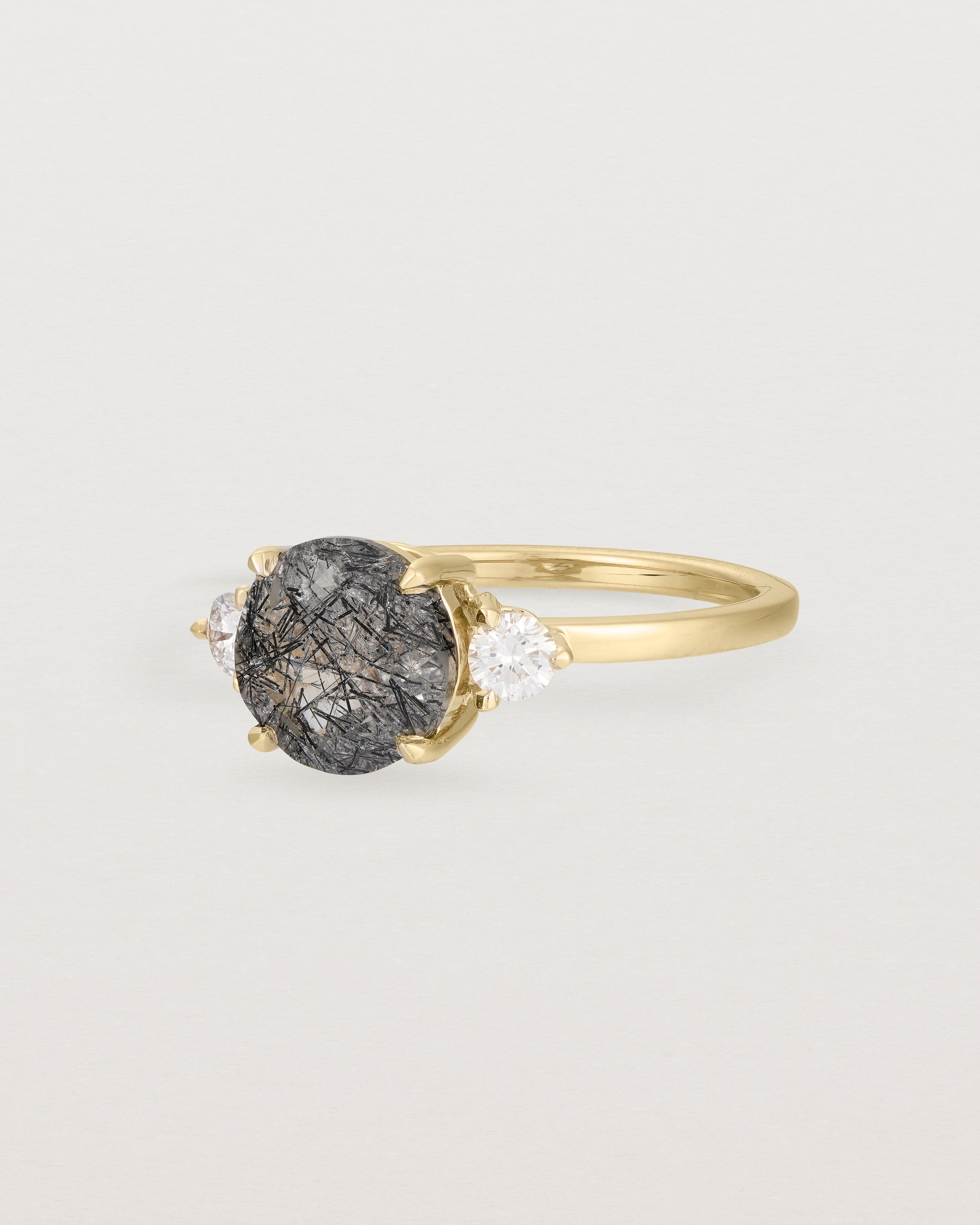 Angled view of the Una Round Trio Ring | Tourmalinated Quartz & Diamonds | Yellow Gold.