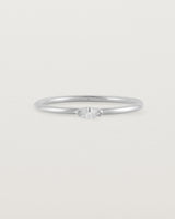Fine white gold stacking ring featuring a white marquise centre diamond