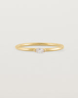 Fine yellow gold stacking ring featuring a white marquise centre diamond