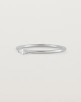 Fine white gold stacking ring featuring a white marquise centre diamond