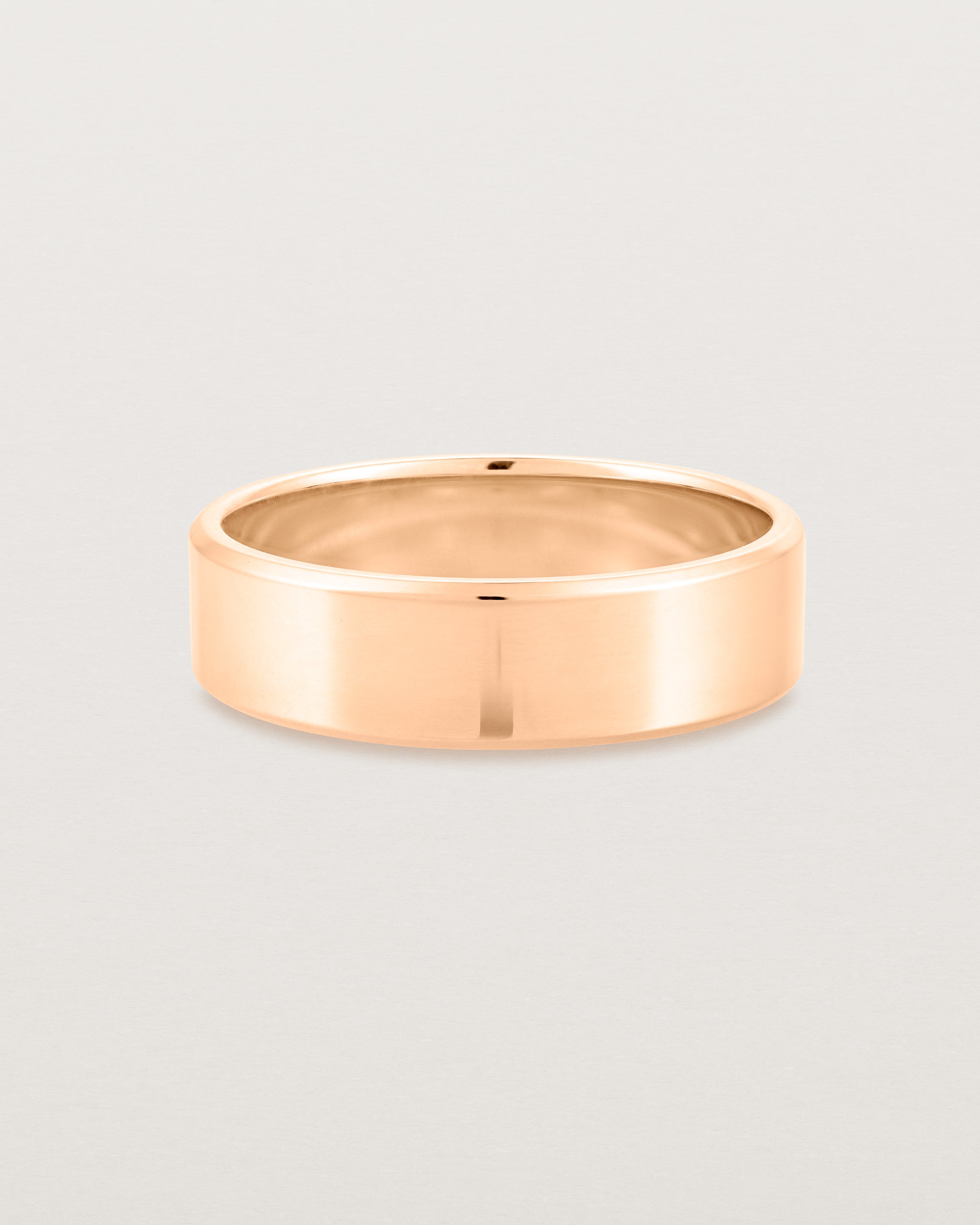 Front view of the Chamfered Wedding Ring | 6mm in Rose Gold.
