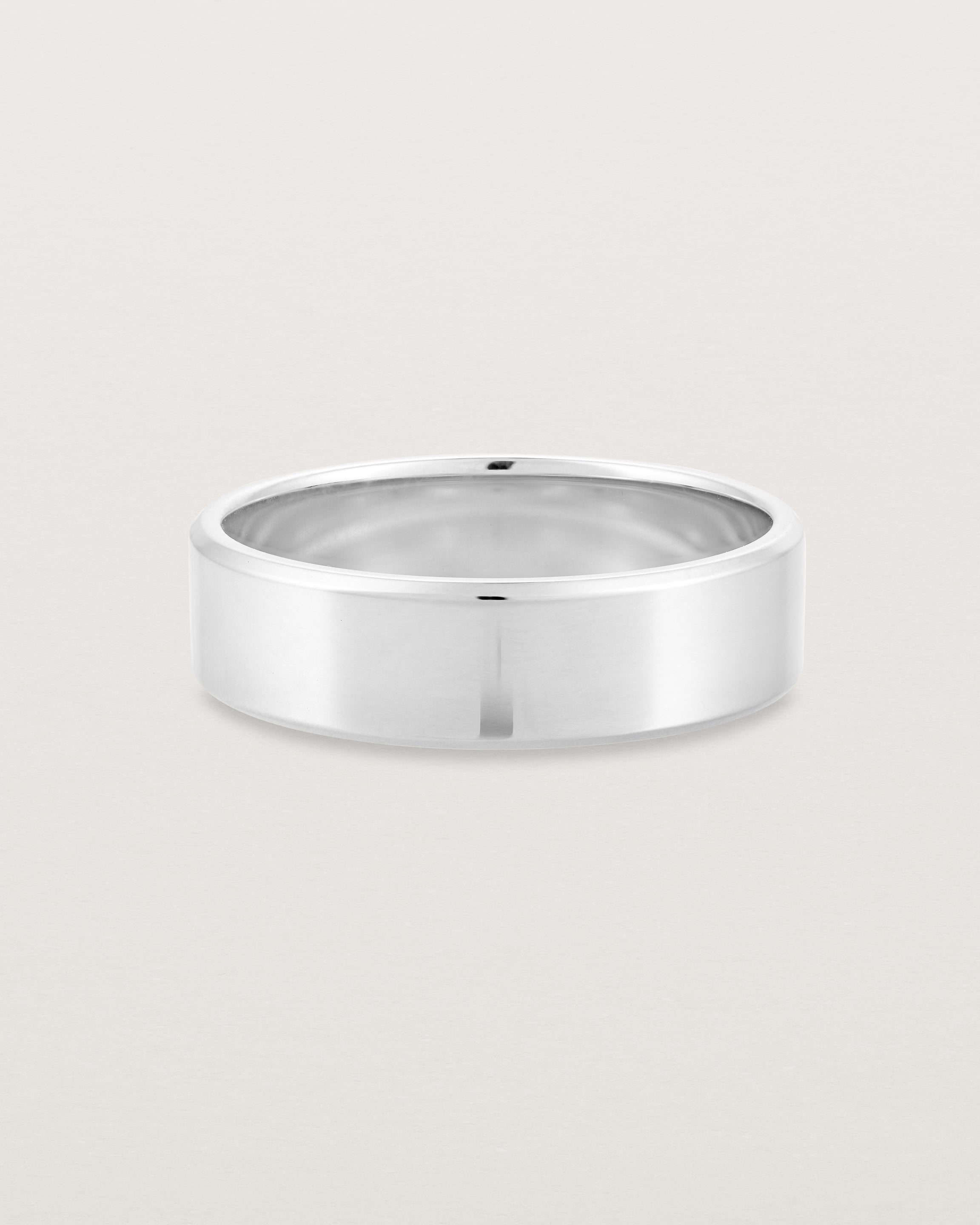 Front view of the Chamfered Wedding Ring | 6mm in White Gold.