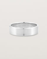 Front view of the Chamfered Wedding Ring | 6mm in White Gold.