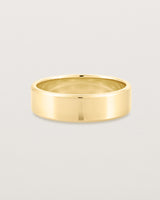Front view of the Chamfered Wedding Ring | 6mm in Yellow Gold.