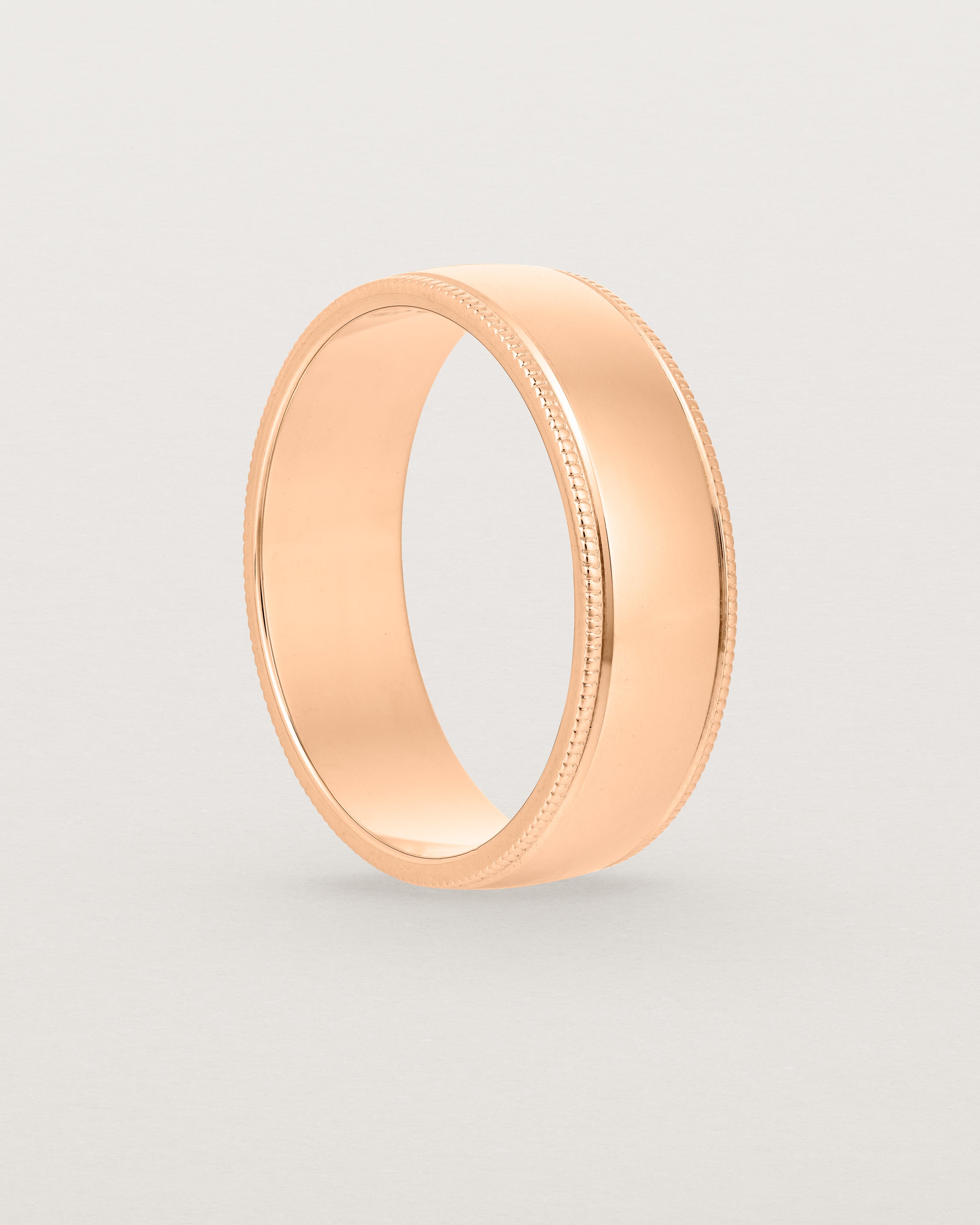 Standing view of the Millgrain Wedding Ring | 6mm in Rose Gold.