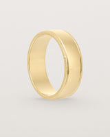 Standing view of the Millgrain Wedding Ring | 6mm in Yellow Gold.
