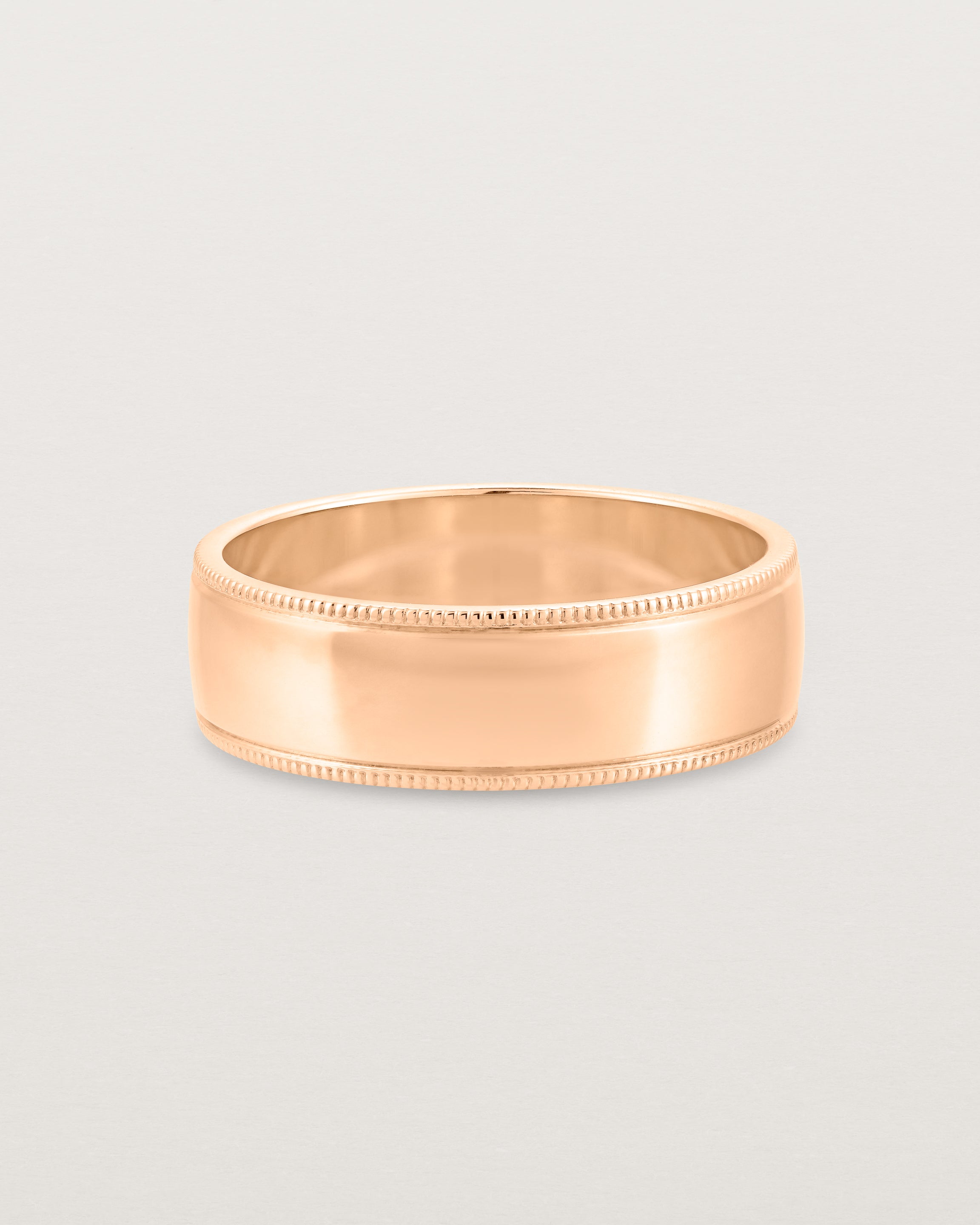 Front view of the Millgrain Wedding Ring | 6mm in Rose Gold.