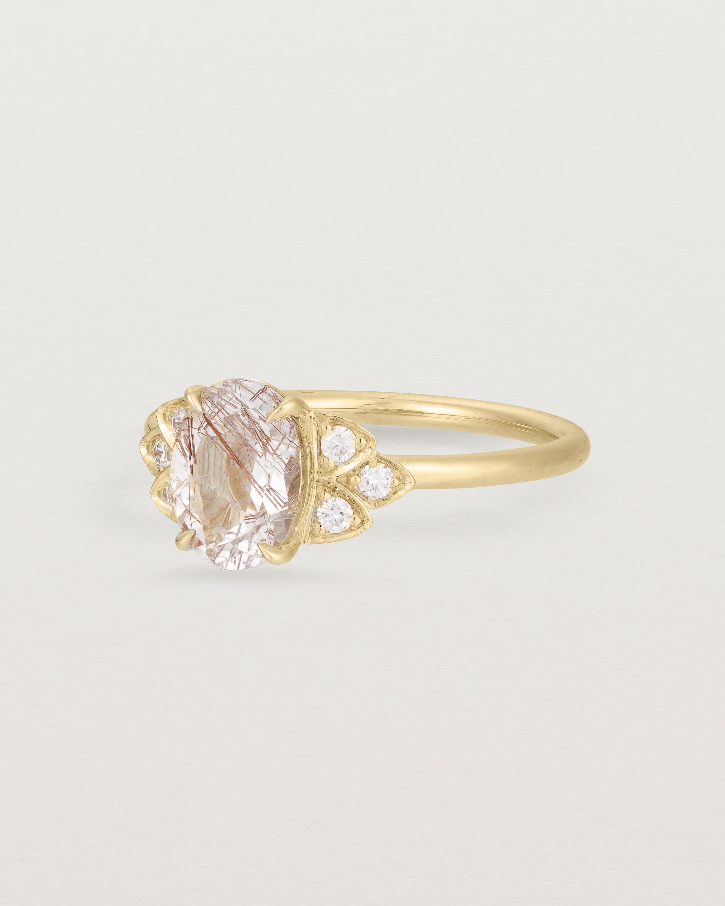 Angled view of the Winnie Ring | Rutilated Quartz & Diamonds | Yellow Gold.